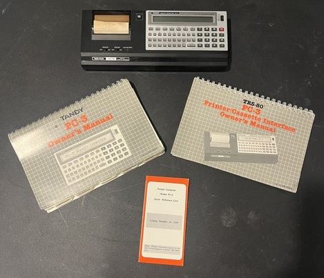 Tandy PC-3 (26-3589) with printer/cassette interface and manuals