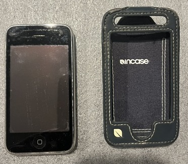 iPhone 3G A1241 in a leather case