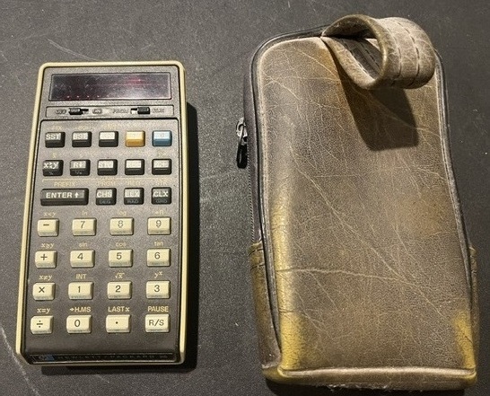 Hewlett-Packard HP-25 programmable calculator with case